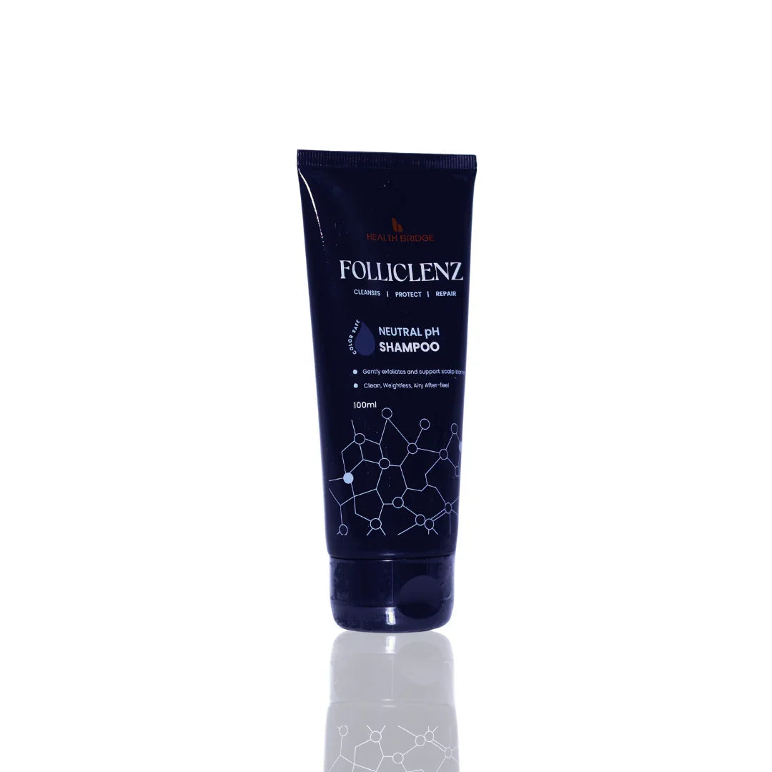 Folliclenz shampoo tube on a white background